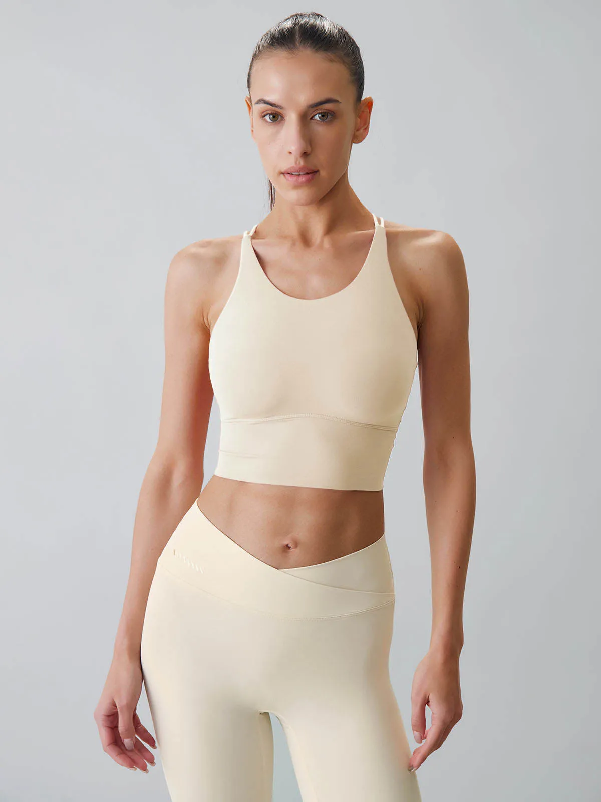 Off White Cut Out Twist Sports Bra - Light Support